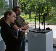 Catherine Bergeson and Jonathan Ribera with sculpture