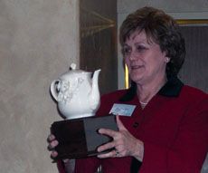 Suzanne Rees with award