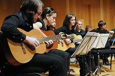 USU guitar ensemble members performing