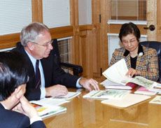Taeko Katagiri shares information with President Albrecht
