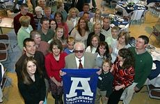 Bob Williams surrounded by family members