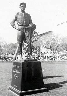 statue of George Woolf at racepark