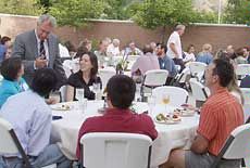 USU President Stan Albrecht with new faculty at reception