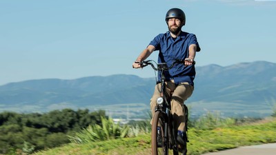 Patrick Singleton, assistant professor of civil and environmental engineering, riding a bike.