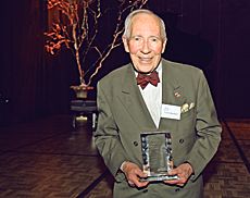 Vernon M. Buehler with the Spirit of Old Main award