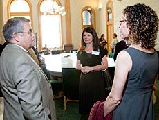 USU Vice President Ross Peterson with Randy Williams and Elisaida Mendez 