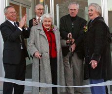 Sisters Kathryn Caine Wanlass and Manon Caine Russell prepare to cut the ribbon