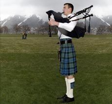 Bagpipe player at memorial