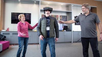 a student wearing a virtual headset.