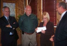 L.J. Godfrey presents AT&T donation to USU representatives