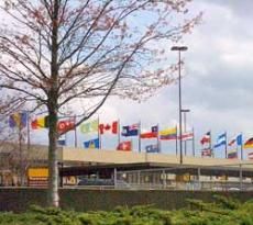 Flags fly over an airport