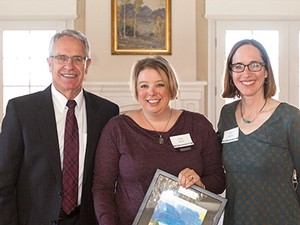 Emily Malik with USU administrators, Campus Compact award