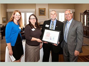 Campus Compact honoree Larry Smith and guests at Campus Compact award ceremony