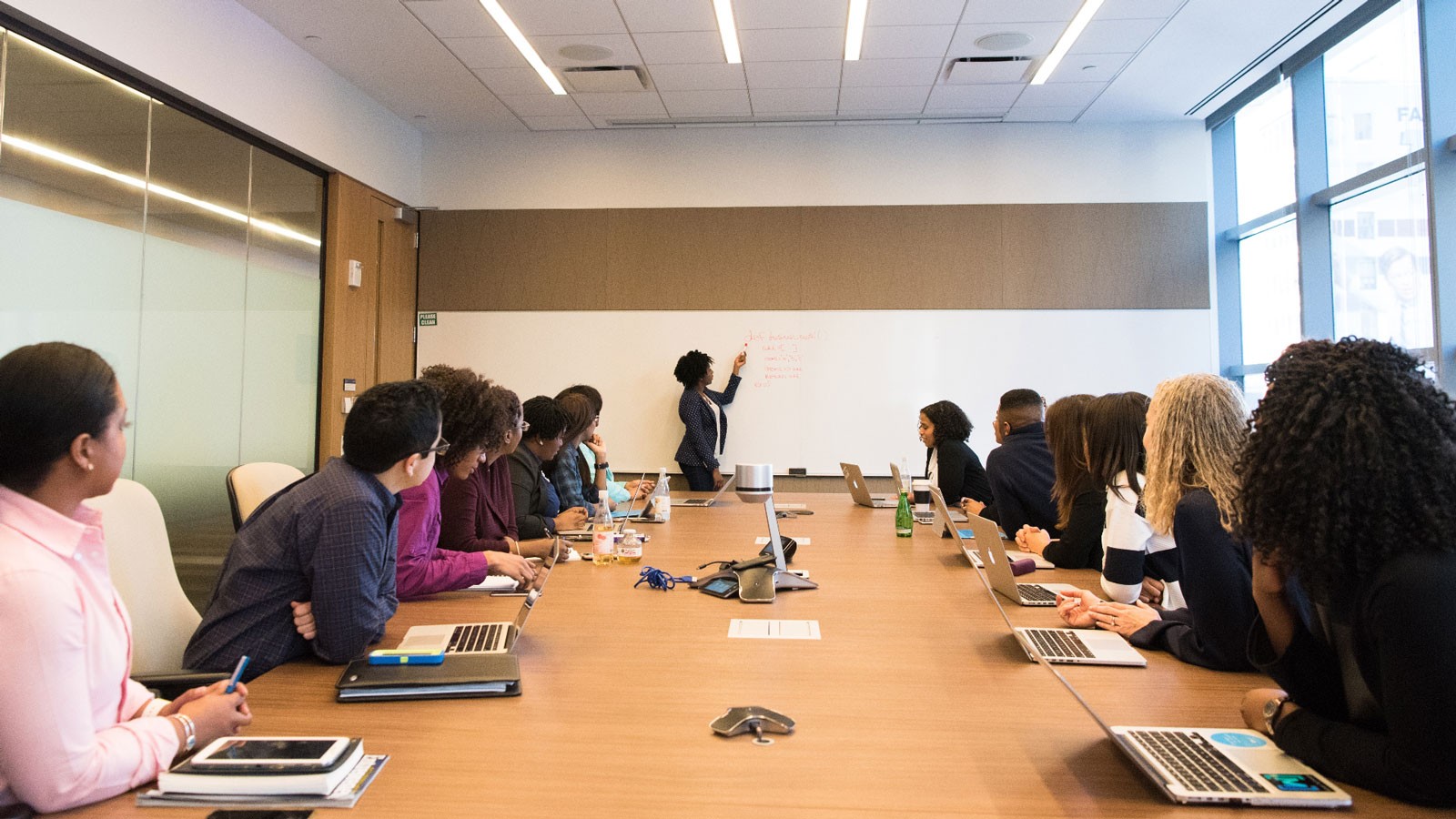 People sit in a conference room.
