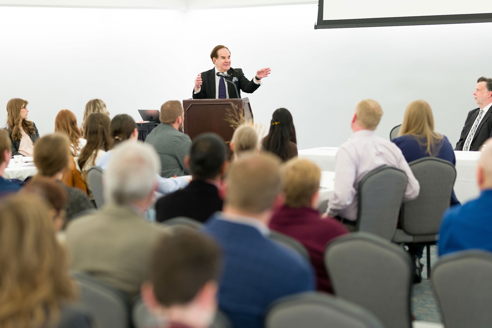 Mehdi Heravi speaking at an event.