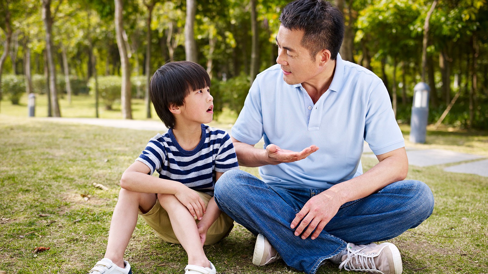 A father talks to a son.