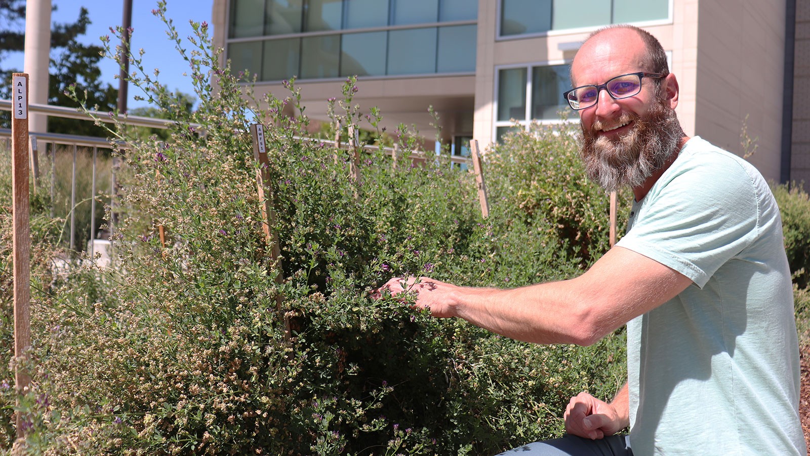 Researcher in garden.