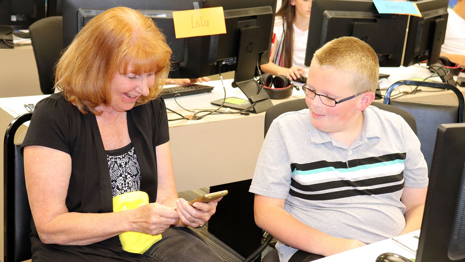 Vicki Allan speaks with a student.