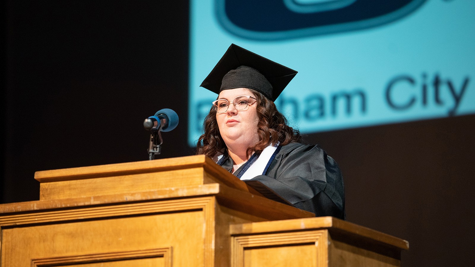 Elise Woolstenhulme speaks during the USU Brigham City graduation ceremony.