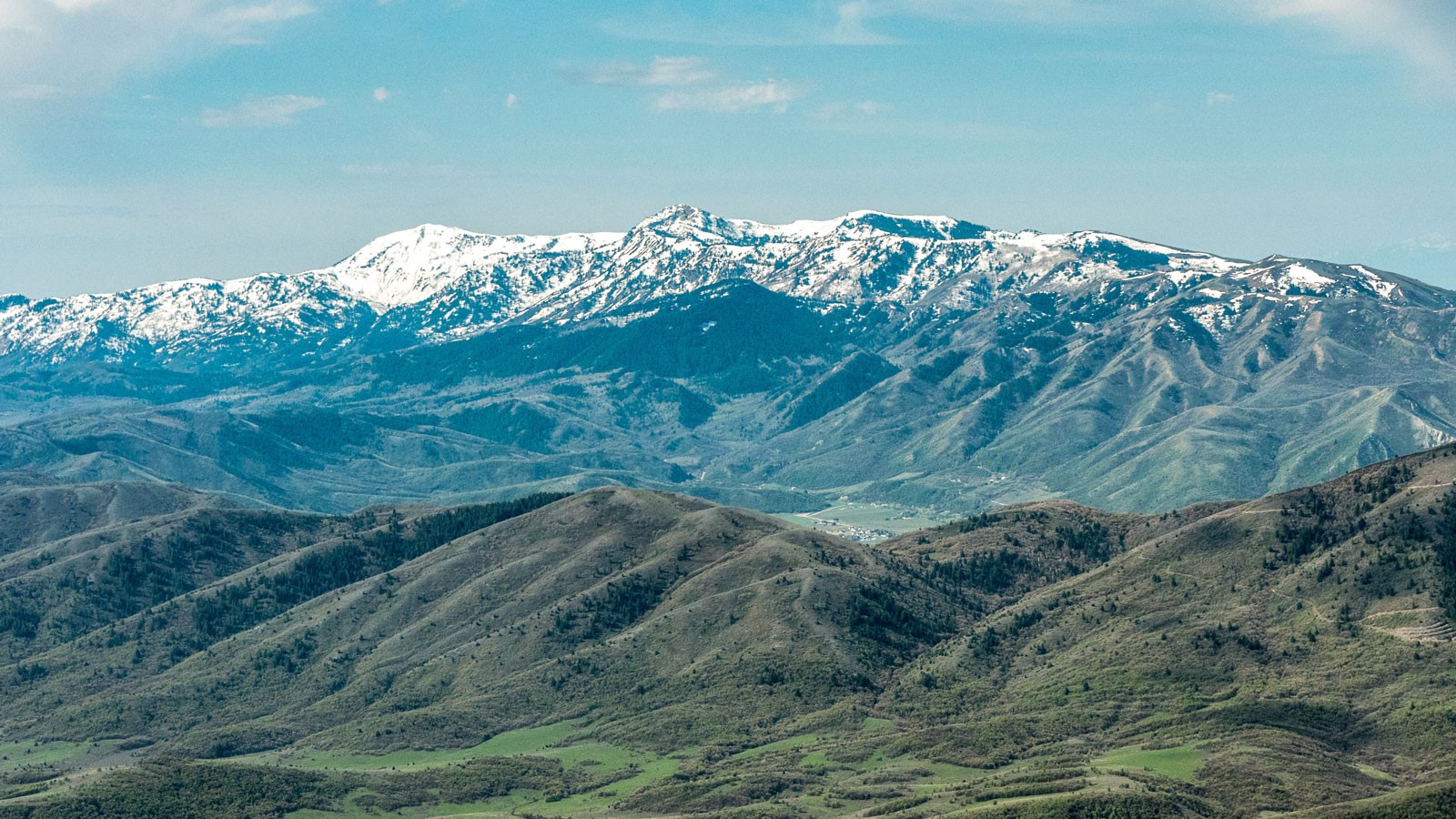 An arial view of mountains and a valley.