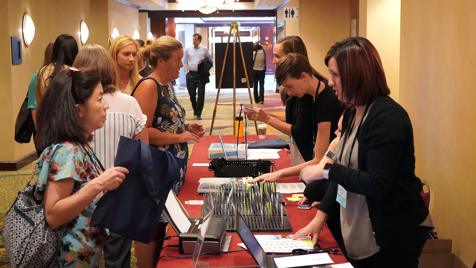 Attendees pick up badges at the 2019 Intertribal Opioid Summit in Price.