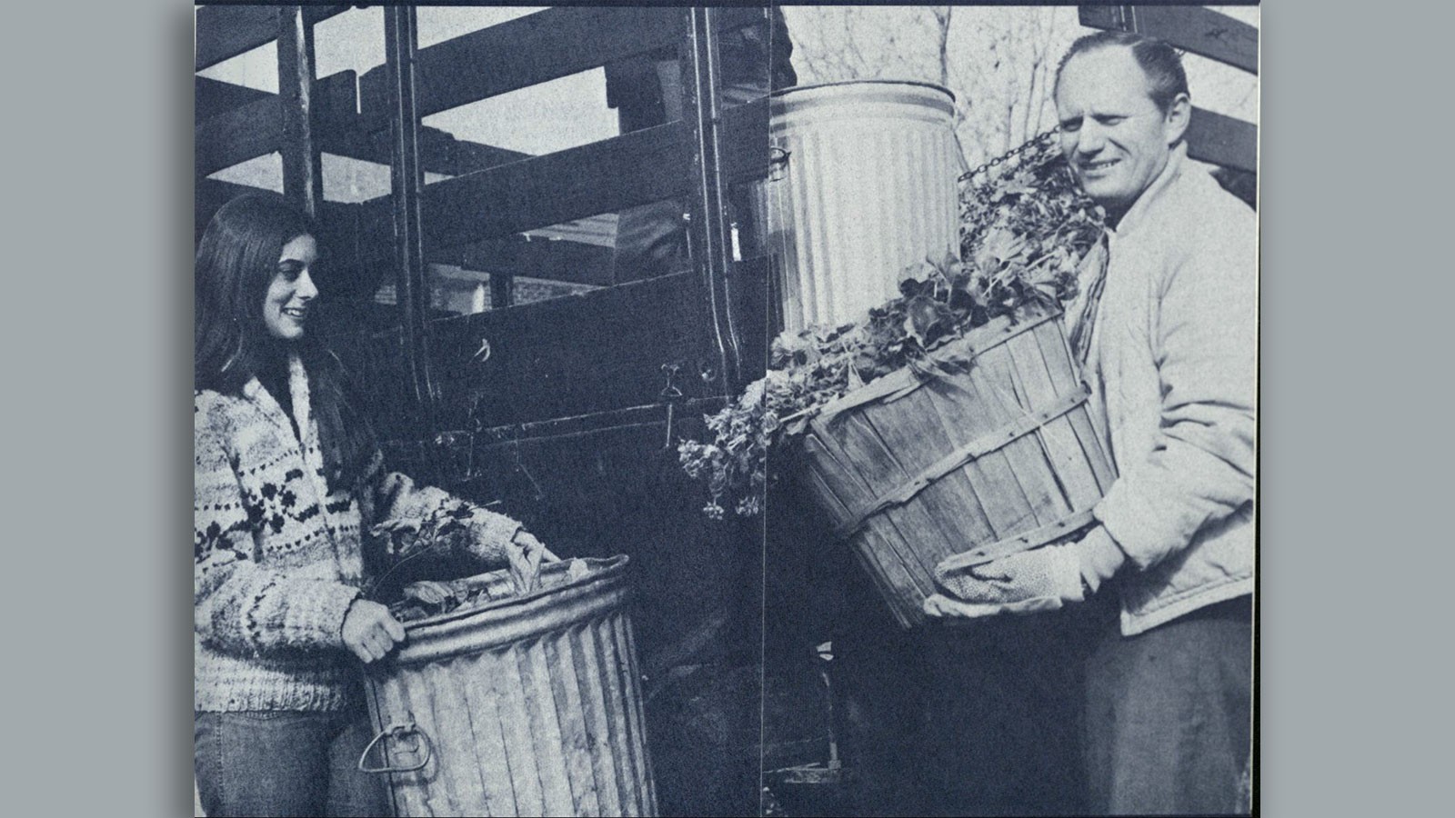 Val R. Christensen and a woman carring leaves in this black-and-white photo.