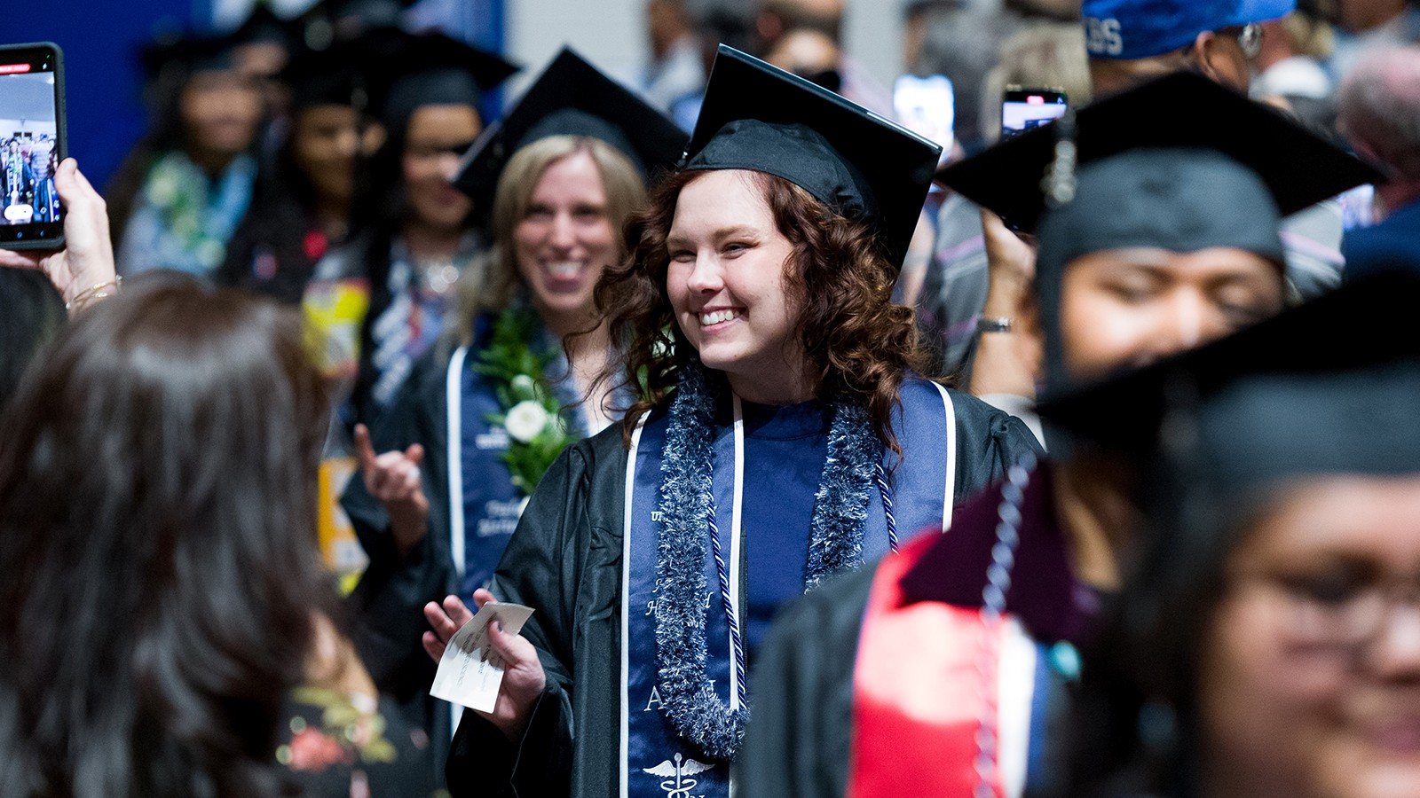 Graduate walks down the aisle