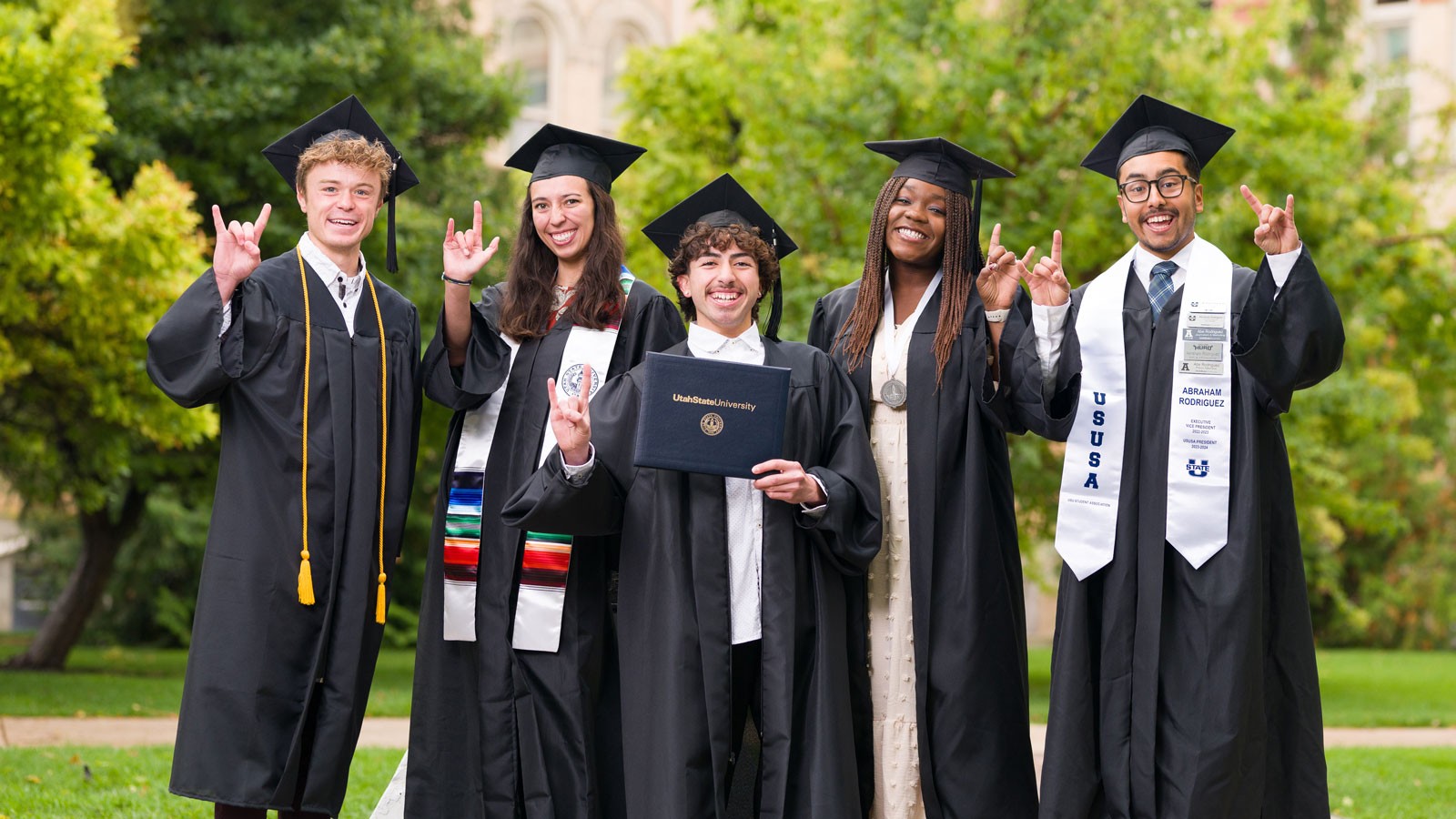 People in graduation robes.