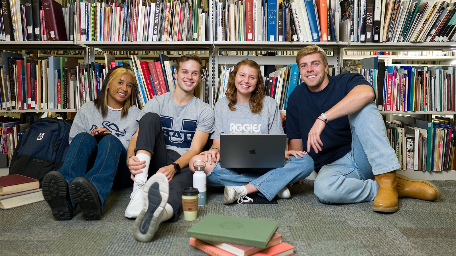 Students sitting in a library.