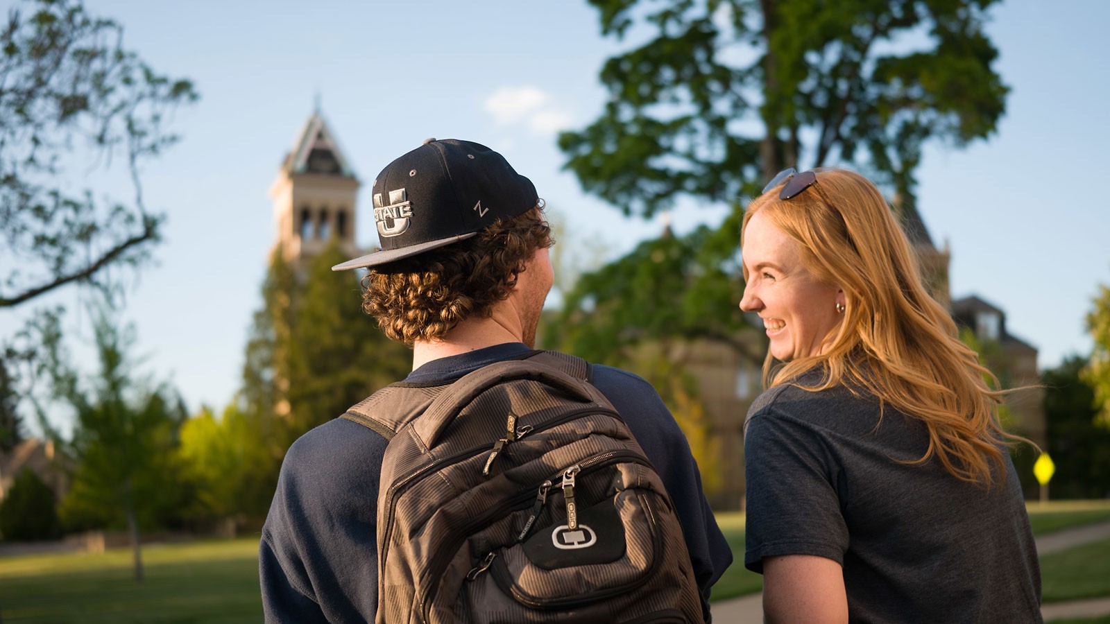 Two students walking on the USU Logan campus.