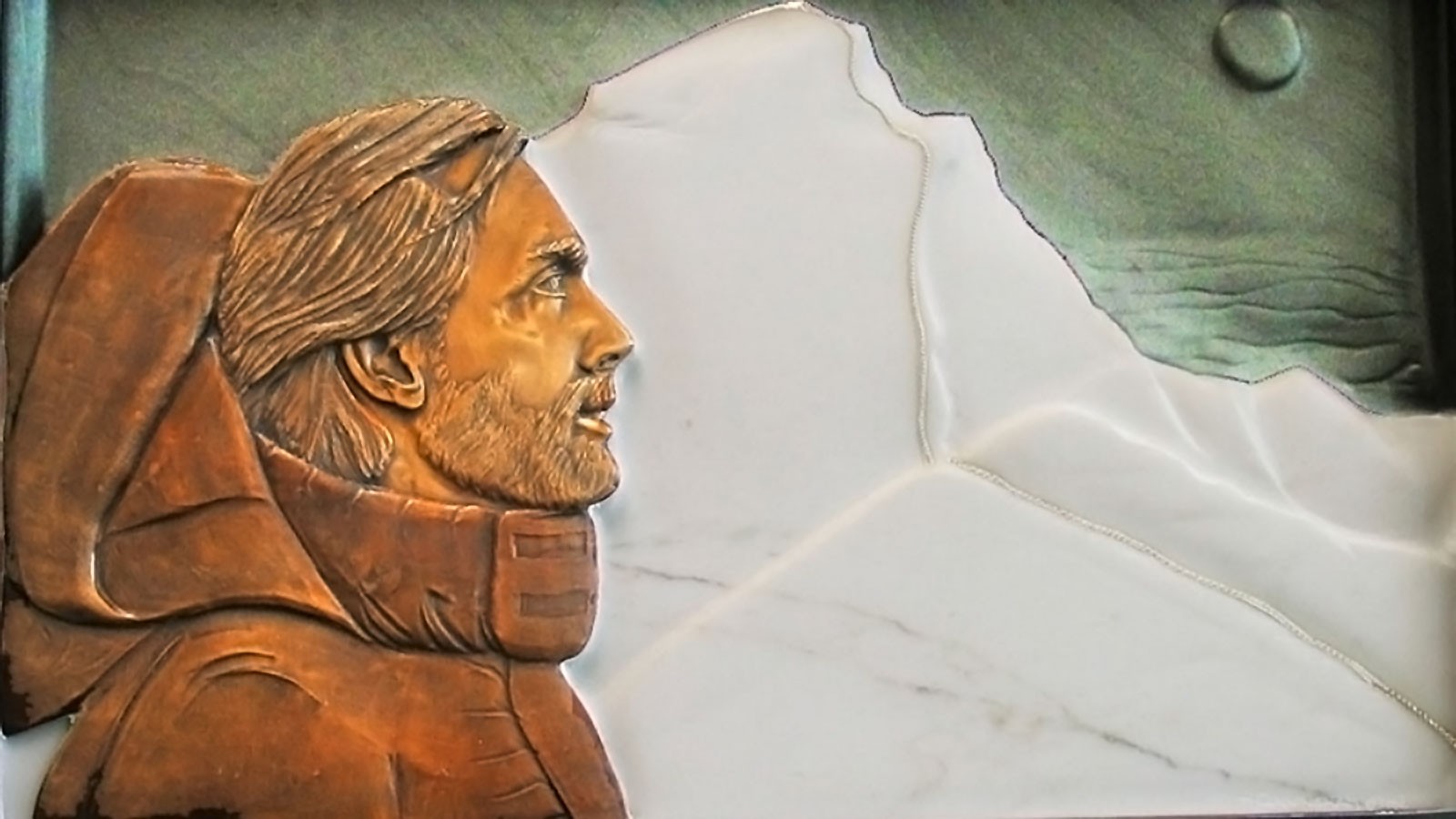 A tactile illustration shows a mountaineer approaching the peak of Mount Everest.