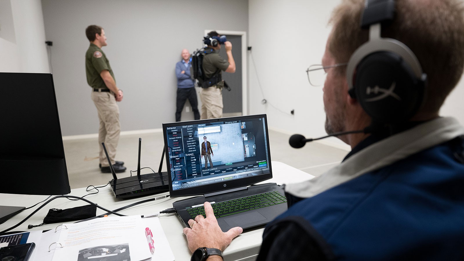 Police officers training with virtual reality equipment.