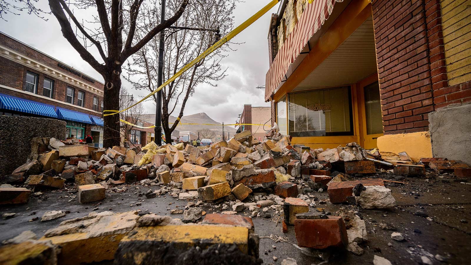 Rubble near a brick building.