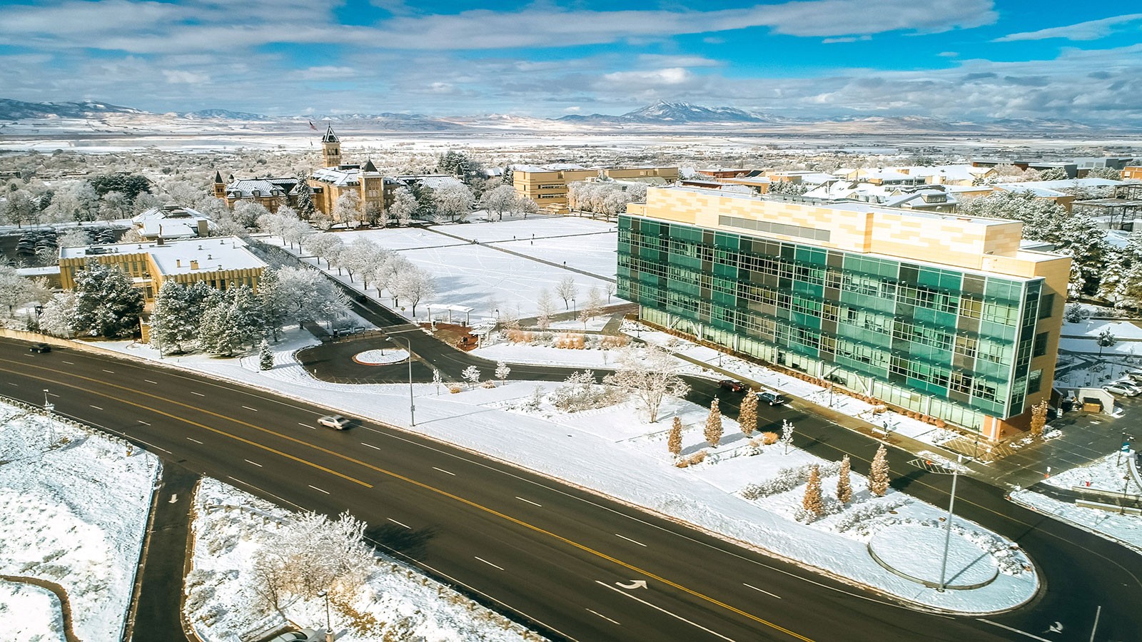 An aerial view of the southwest side of the USU Logan Campus in winter.