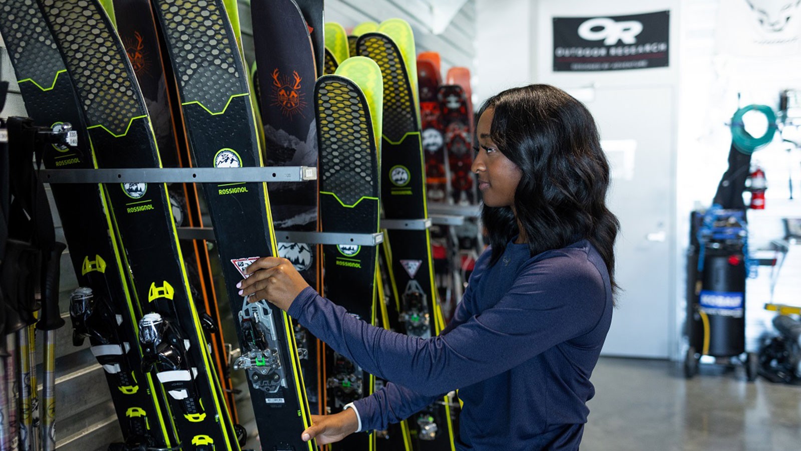 A person working in a ski shop.