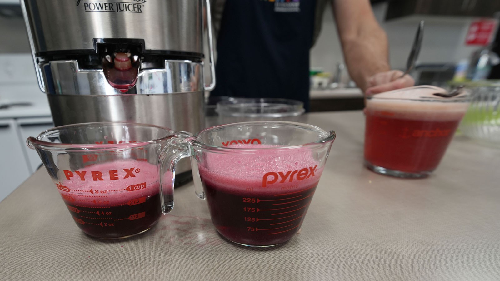 Pomegranate juice in a kitchen.