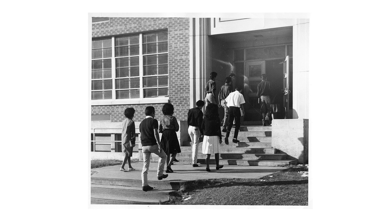 Students entering a school.