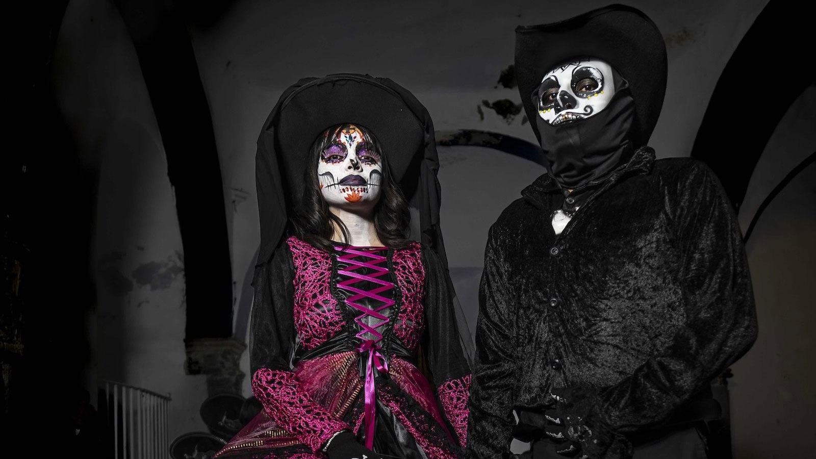 People in costume for Dia de Los Muertos.