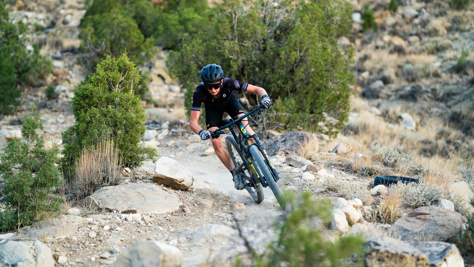 A person riding a mountain bike.