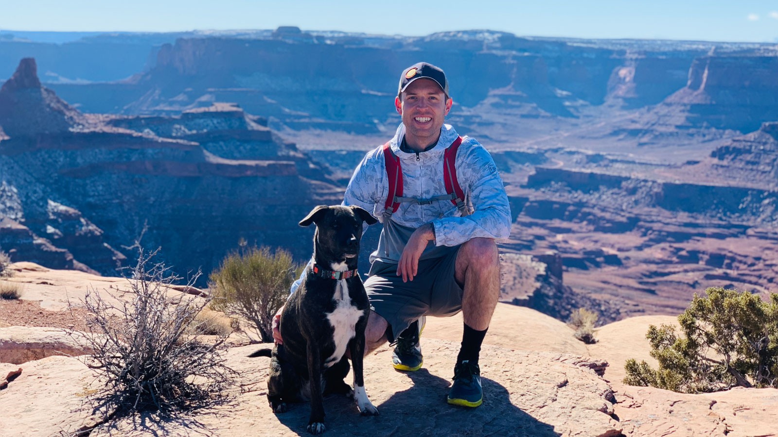 Logan Wilber and his dog in Southern Utah.