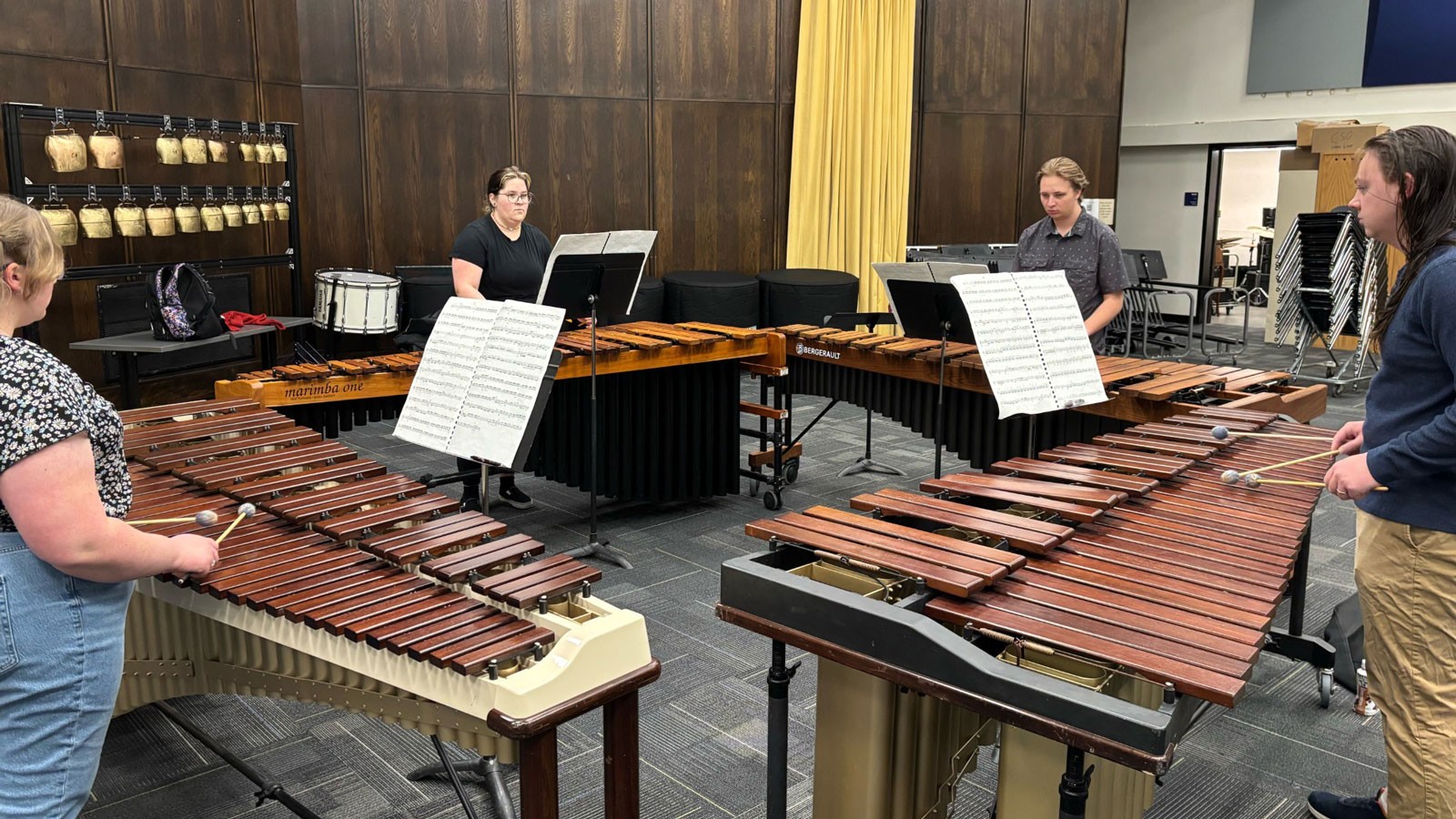 Percussionists practicing in a music room.