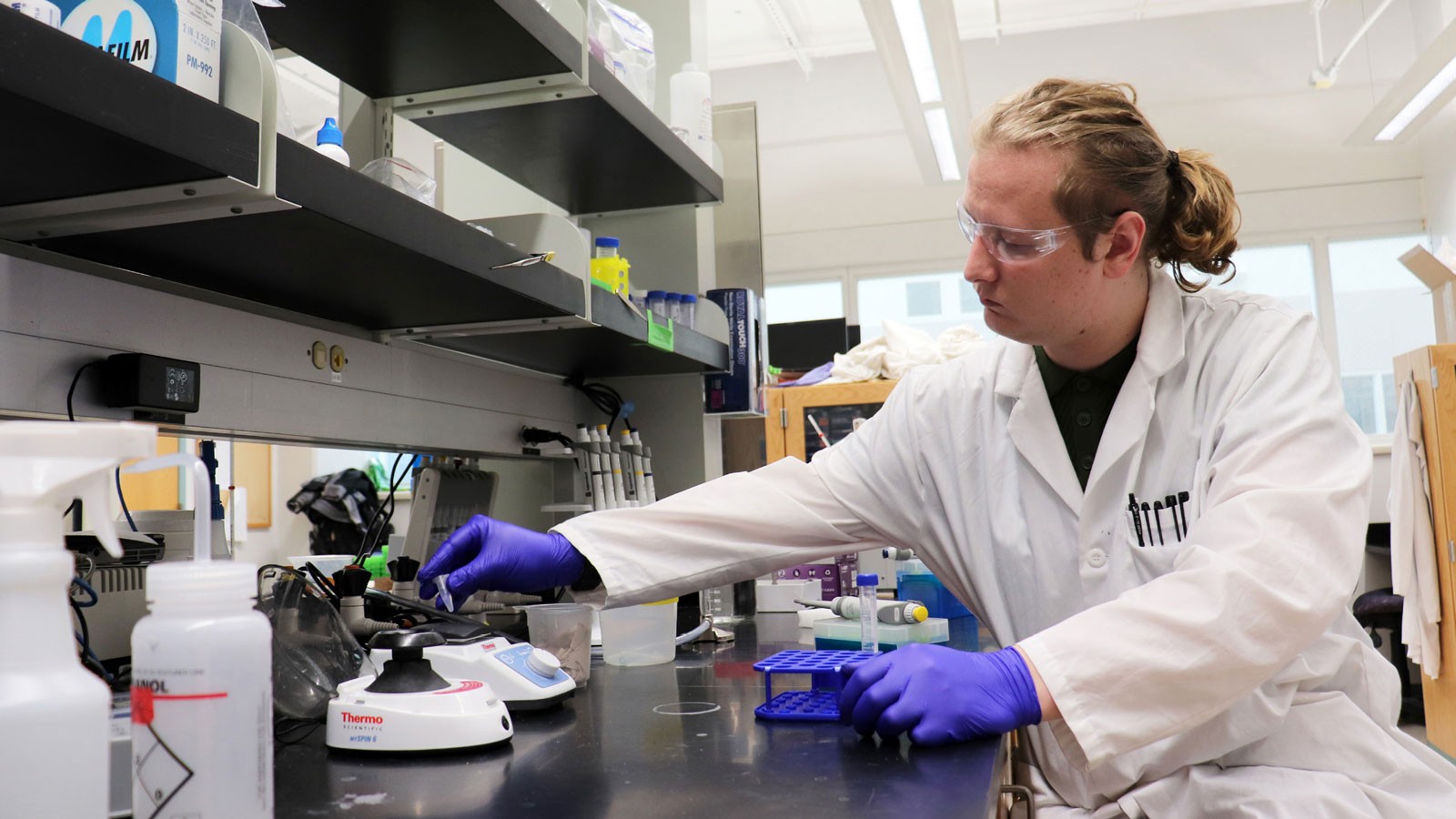 Brendon Guinn working in a lab.