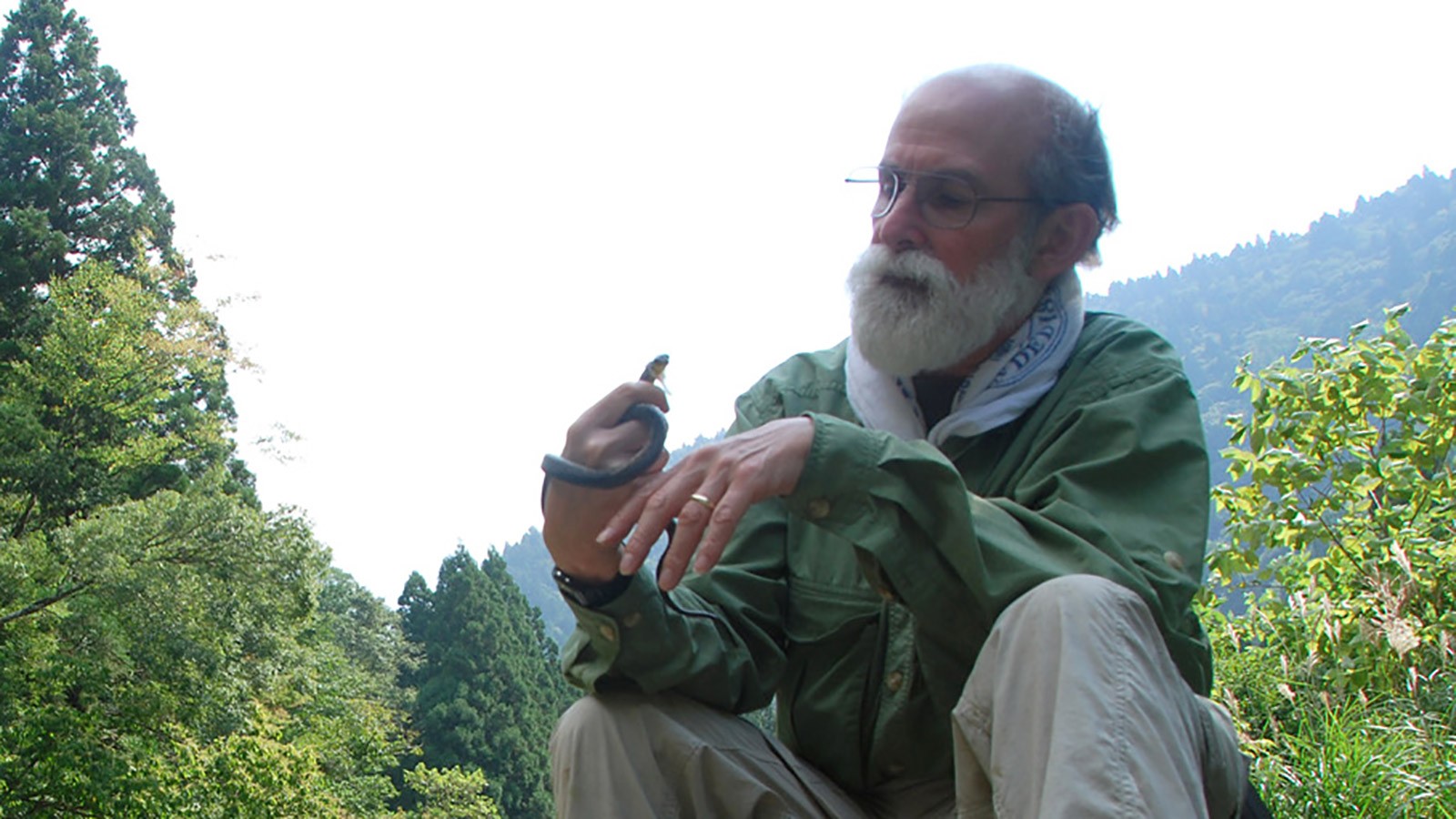 USU herpetologist Al Savitzky with keelback snake