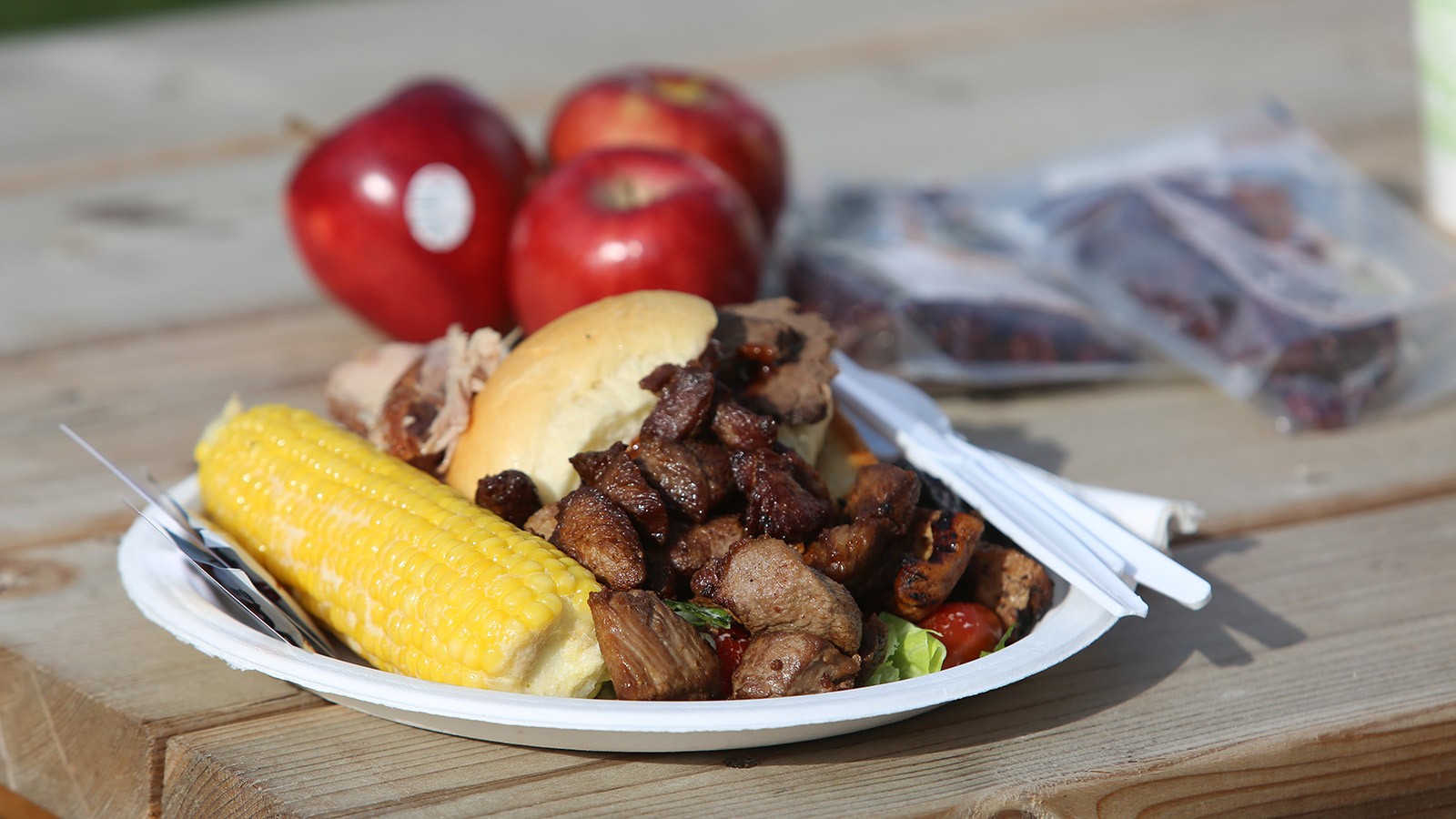 BBQ food on a picnic table.