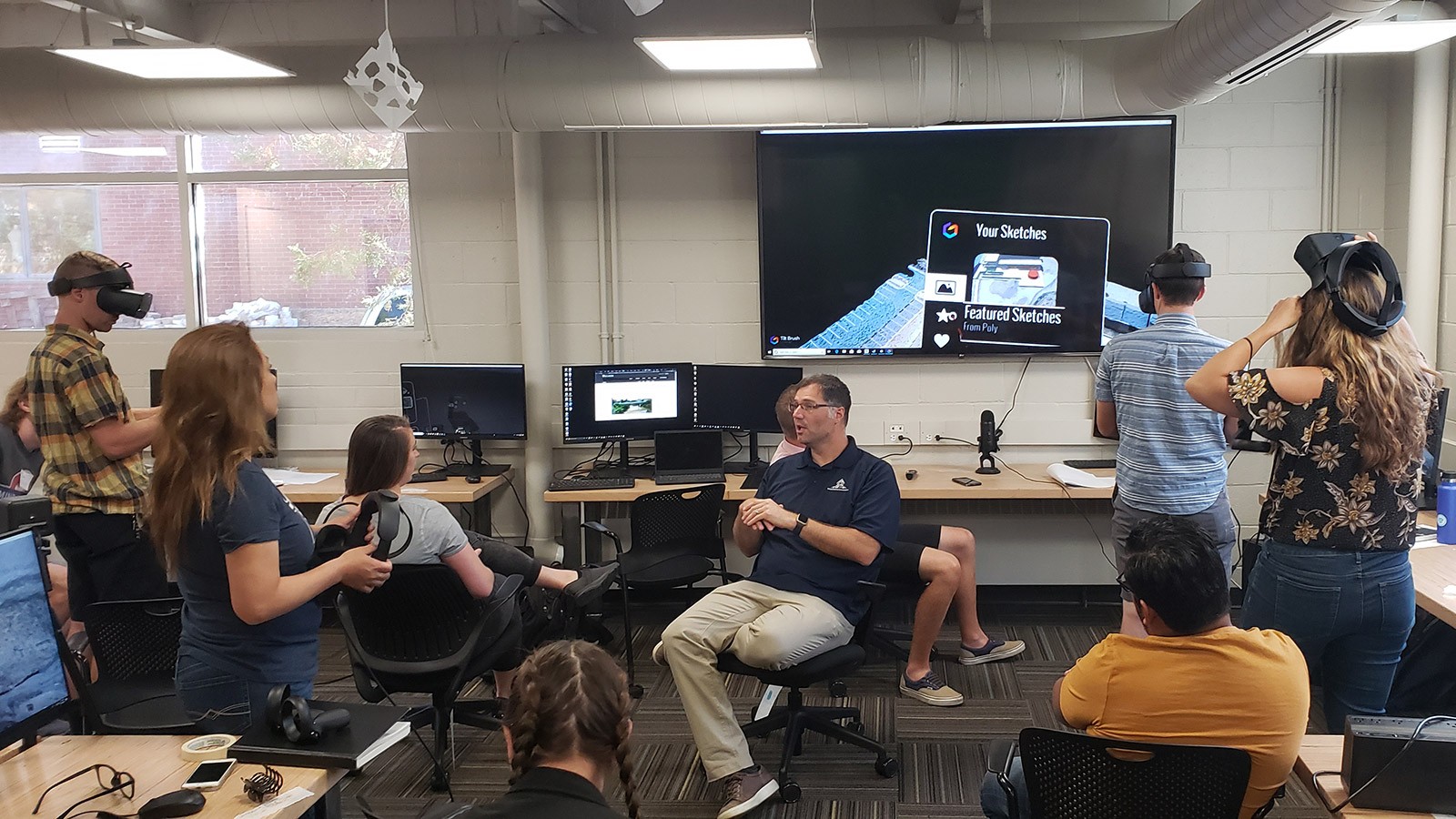 Assistant Professor Ben George (center) with students.