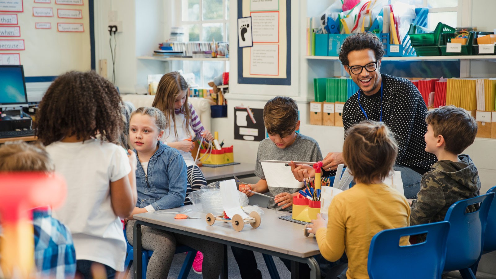 Students and educators in a classroom.