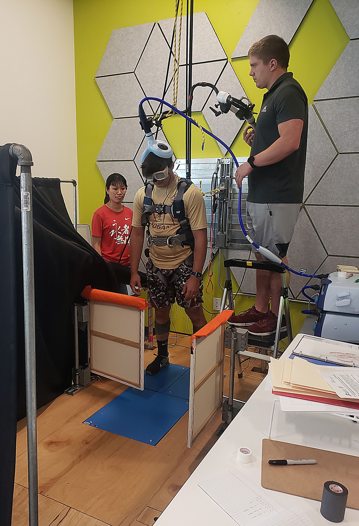 Hunter Horsley (center) tests research equipment.