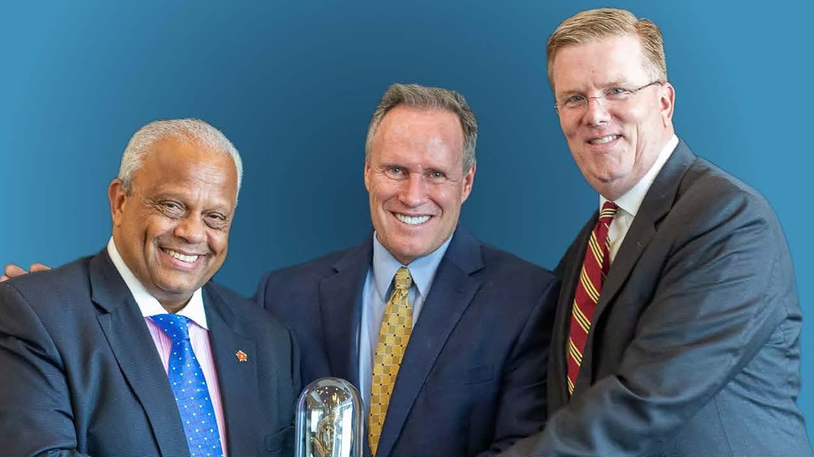 Lord Michael Hastings (left) and Boyd Craig (right) with Stephen M. R. Covey.