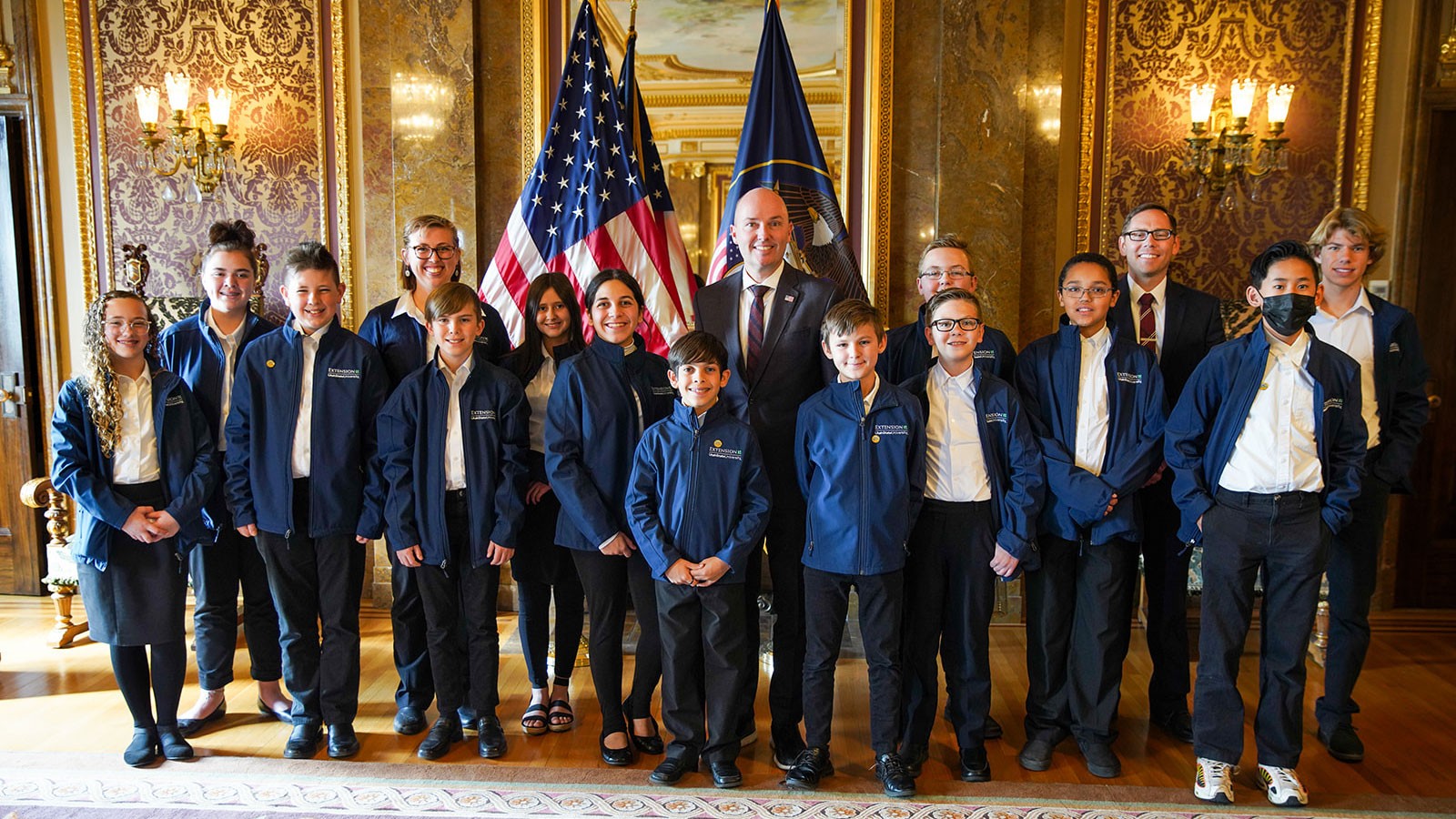 Washington County 4-H students pose with Utah officials at the state capitol.