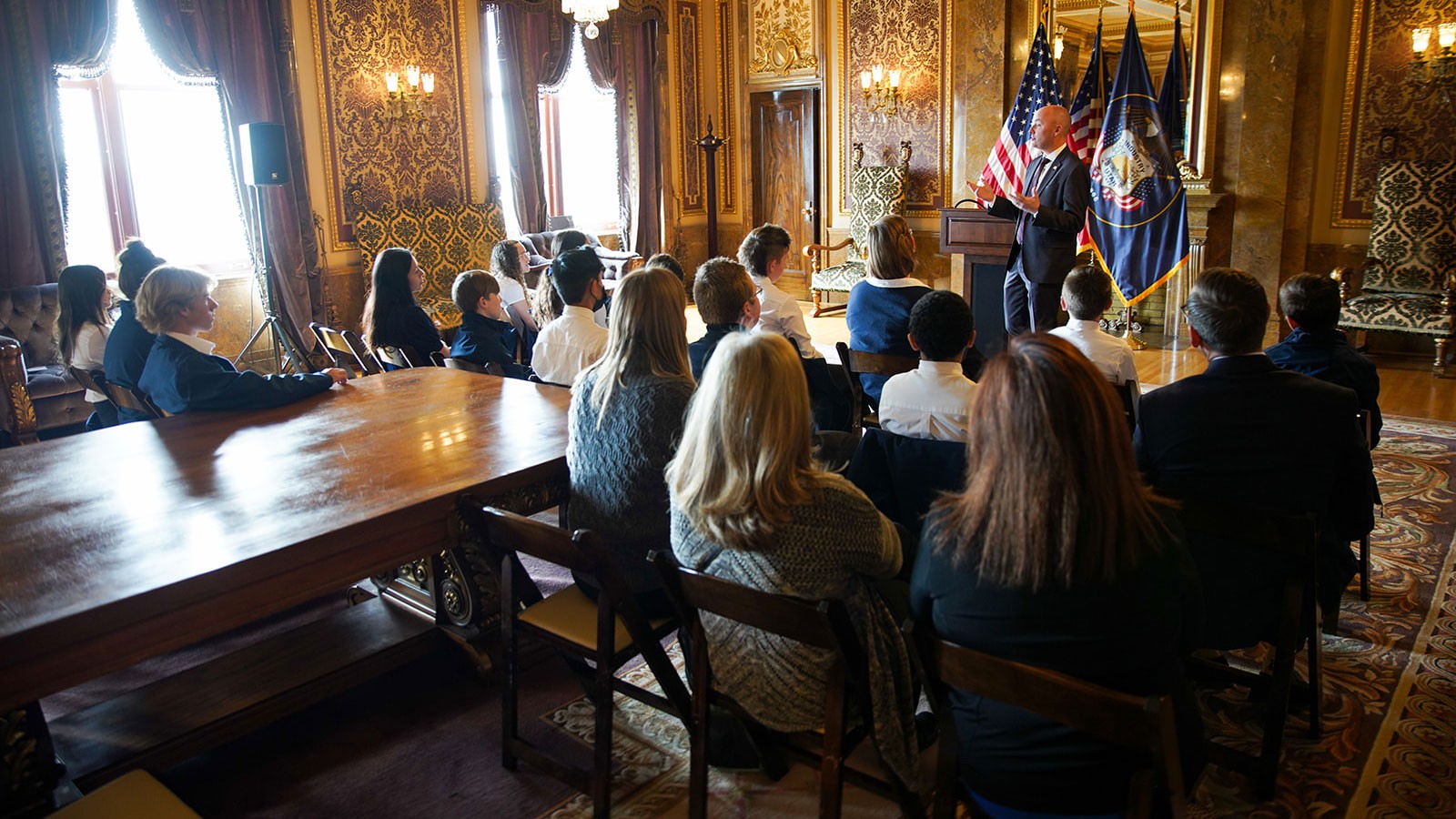 Students listen to Utah's governor.